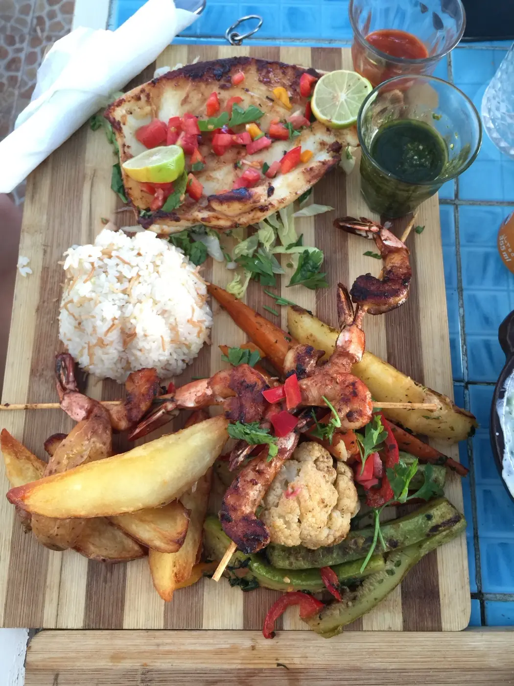 A generous shared Egyptian meal laid across the table