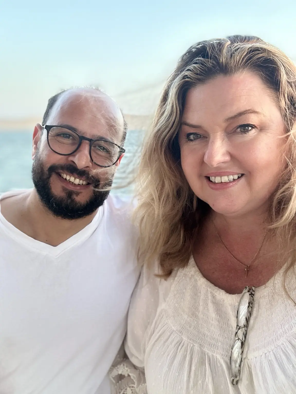 Petah-Jane Hall and Abdou together beside the water in Egypt